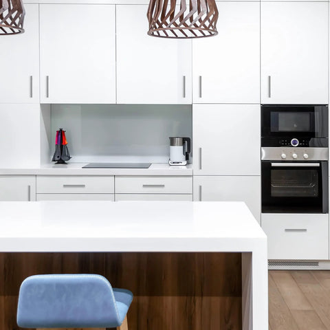 Modern kitchen with satin nickel cabinet pulls and white cabinets, featuring 30 Pack 4 Inch Satin Nickel Cabinet Pulls For Kitchen Cabinets With Six And Three Eighths Inch Overall Length And Four Inch Center To Center Mounting One Half Inch Diameter And One And Quarter Inch Projection.