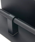 Close-up of Stainless Steel Double Toilet Paper Holder With Shelf Wall Mounted Matte Black Finish Rustproof SUS304 Construction.