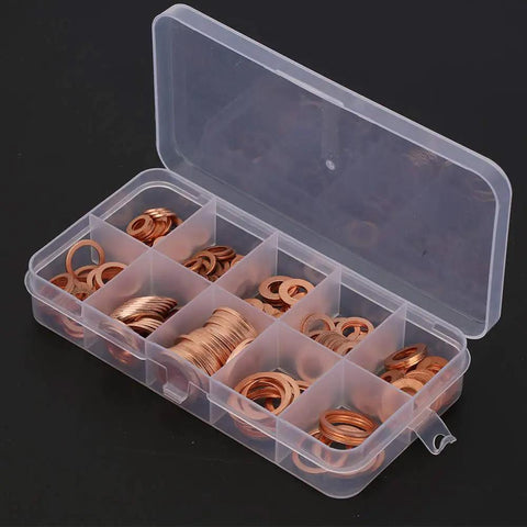 Massive Haul Of 200 Solid Copper Flat Washers Assorted Range From M5 Up To M14 Showing Off Superior Conductivity For Grounding Systems And Heat Dissipation Great For Mechanics And Car Guys Using Them On Shop Floors Inside a Storage Box. Copper flat washers in plastic organizer box