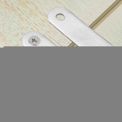 Close-up of a silver tone bracket from 10 Pack Repair Plate Set 30mm by 8mm Flat Corner Brace Bracket Connector For Quick Fixes And Mending.