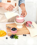 Stackable Measuring Cups And Spoons Set 10 Piece With Stainless Steel Handles Pink Kitchen Gear in use for baking