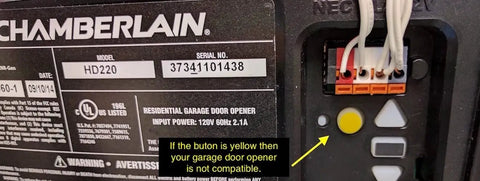 Close-up of Chamberlain HD220 garage door opener with yellow button, indicating incompatibility with Smart Garage Opener Controller For iPhone Android And Apple Watch With No Fuss Setup And Secure Bluetooth 4.0 Access Lets You Open Your Garage Right From Your Phone Or Smartwatch Works With Most Garage Door Openers.