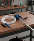 Super Handy Gralaria Manual Oil Transfer Pump For Mechanics And Garage Pros With 2M Hose Plus 32Cm Inlet Pipe on a workshop table.