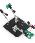 Helping Hands Soldering Station With Rock Solid 3.9 Inch Base Four Flexible Magnetic Arms And Adjustable Stand in use