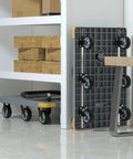 Foldable Heavy Duty Platform Cart With 1764 Pound Capacity stored upright against a wall, showcasing six wheels including a spare