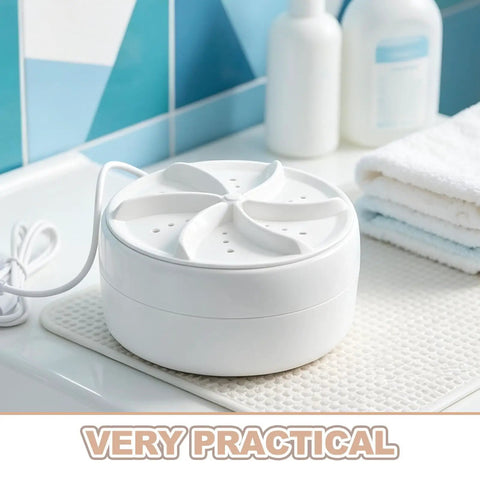 Chill Road Trip Ready Mini Turbo Washer Built For Real Deal RV Campers And Frequent Travelers on a countertop.