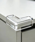 Soft PVC L Shaped Corner Protectors 4 Pack With Adhesive for tables and cupboards anti collision edge guard on white desk