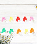 Assorted colors Stick On Cabinet Locks 10 Pack Self Adhesive PP Material Kid Proof Latches on white background with daisies.