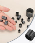 Premium 8 Pack Pom Plastic Sleeve Bearings And Oilless Bushings, black POM bushings shown in hand, various sizes for motor rebuilds.
