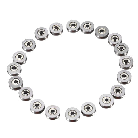 V Groove Ball Bearing Set 20 Pcs Miniature Steel V Pulley Bearings 3x12x4mm arranged in a circle on a white background
