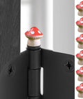 Set Of 6 Red Hinge Head Decorative Toppers For Doors With Magnetic Hinge Heads Mushroom Style Quirky Miniature Trinkets Hinge Pin Topper Decor For Doors And Cabinets Easy Magnetic Placement On Any Metal Surface shown installed on a door hinge.