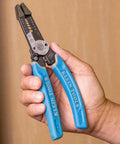 Hand holding Heavy Duty Wire Cutters With Lock And Built In Wire Stripper, 8 To 18 AWG Solid And 10 To 20 AWG Stranded, Made In USA