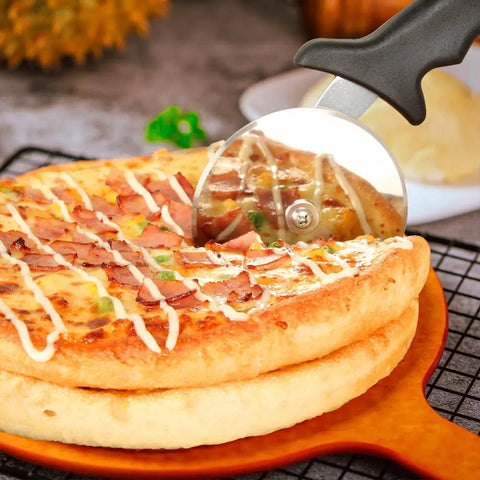 Stainless Steel Pizza Cutter Wheel 9.33 Inch Heavy Duty Rolling Slicer With Finger Guard slicing pizza on wooden board