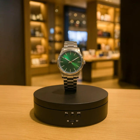 Stunning Motorized Rotating Display Turntable With Electric Stand In Matte Black Featuring 3-Speed Options And Adjustable Angles For Dynamic Product Showcase Supporting Up To 11 Pounds Load Via Usb Or Battery Power showcasing a watch.