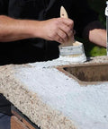 Applying Brushable Chimney Crown Repair Elastomeric Waterproof Coating for Crowns and Masonry Flexible Sealant Prevents Leaks Cracks Quick Setting Long Lasting Protection 2 Gallon to crown top with brush