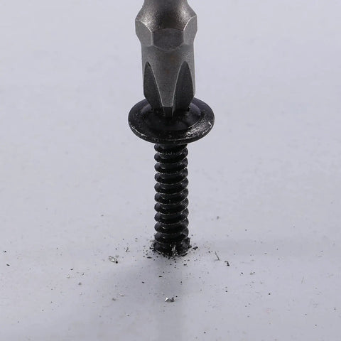 Top Tier Number 8 By Half Inch Sheet Metal Screws With Truss Heads 100 Pack Of 410 Stainless Steel Fast Self Tapping Bolts In Black Oxide Finish, close-up of installed screw and bit.