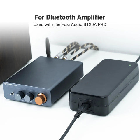 48V 5A Power Supply For Home Audio Amplifiers And Bluetooth Stereo Receivers Stable 48 Volt Adapter next to a Bluetooth amplifier