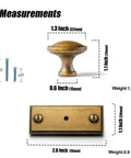 Measurements of Six Pack Dope Antique Brass Cabinet Knobs With Backplates, 1.3 inch knob, 2.8 inch backplate, shown with screws