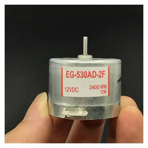 12V Micro DC Motor EG-530AD-2F CW For Cassette Deck Capstan Spindle Replacement, 2400RPM Tape Recorder Motor, in hand close-up.