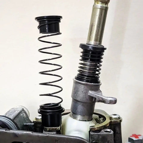 No Nonsense 5 To 6 Speed Manual Transmission Shift Cable Bushing And Gearbox Repair Kit spring and linkage close-up