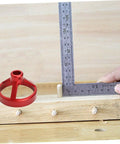 Pro Level 7 Piece Metal Hole Puncher And Drill Guide For Woodworking Rock Solid Alignment Tool Dead Nuts Accurate Positioning Kit 6 To 10 Millimeters Angled Fixture red drill guide on a wooden surface