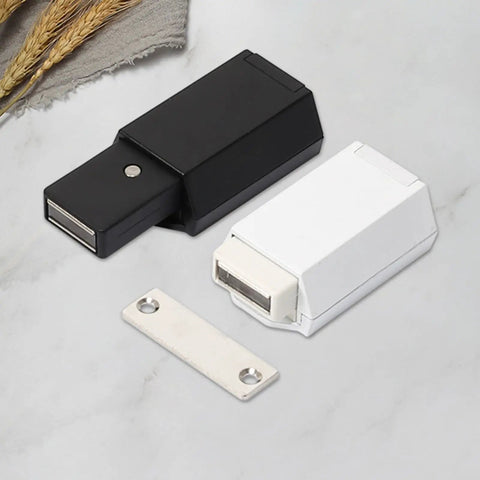 Push To Open Cabinet Catch With 25 Lbs Magnetic Hold, Spring Loaded Door Latch in black and white with metal plate on table
