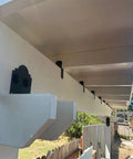 Super Sturdy Rock Solid Post Cap Tie Brackets For 4x4 Wood Decks And Joist Hangers installed on pergola beams outdoors