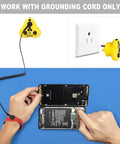 Person using 2 In 1 ESD Wrist Strap With Grounding Plug For Easy Grounding From Outlet Socket Static Control Anti Static Silicone Bracelet Earth Bonding Plug For Rubber Mat with device.