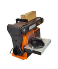 Mini Pneumatic Belt Sander And Grinding Wheel Combo Machine With Variable Speed Control, Cast Iron Base For Wood And Metal Deburring, Angle Sanding Head Lightweight Bench Grinder For Fine Polishing Work showing sander with wooden block.