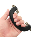 Hand holding 4 Pieces Vintage Style Luggage Handle Fittings In Black Leather And Plastic Replacement Hardware for Suitcases