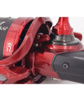Close-up of red Basia Surf 45 SCW QD Surfcasting Reel parts and construction.