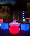 Outdoor garden with glowing 16 Inch LED Cube Light With Detachable Charging Cordless Setup, Remote Control Side Table