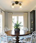 Two Light Globe Glass Ceiling Light Fixtures Semi Flush Mount for living room with round table and chairs.
