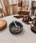 Vintage Motorcycle Chain Ashtray With Wrench And Bike Motif For Biker Bars Harleys And Smoking Rooms A Dope Gift For Men Mechanics Smokers Great Desk Accessory For Man Caves And Home Bars, showing circular design with detailed wrench motif on a table.