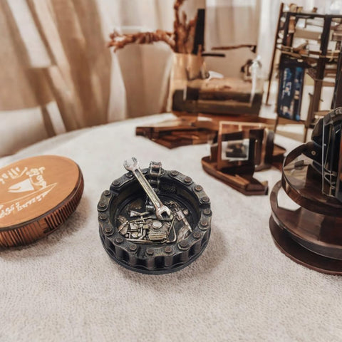 Vintage Motorcycle Chain Ashtray With Wrench And Bike Motif For Biker Bars Harleys And Smoking Rooms A Dope Gift For Men Mechanics Smokers Great Desk Accessory For Man Caves And Home Bars, showing circular design with detailed wrench motif on a table.