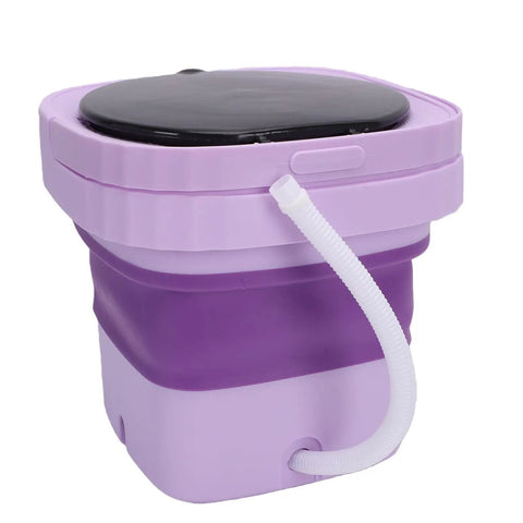 Slick Mini Folding Washing Machine 6 Liter Portable Unit designed for college dorms, purple collapsible body with drain hose.