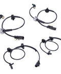 Set of four black ABS wheel speed sensors with gray connector housings and wiring for front and rear wheels.