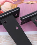 Close-up of Badass Heavy Duty Iron Barn Door Hinges With Screws, 2 To 8 In Steel Pivot Plates for wooden gates.