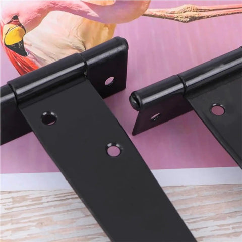 Close-up of Badass Heavy Duty Iron Barn Door Hinges With Screws, 2 To 8 In Steel Pivot Plates for wooden gates.