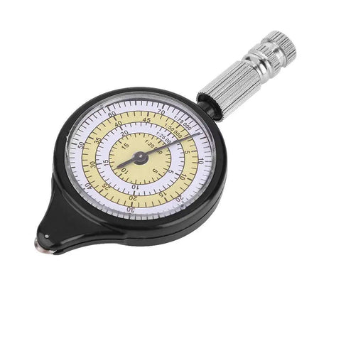 Rugged Mini Map Measuring Wheel For Dead Accurate Outdoor Distance Tracking And Trail Navigation Featuring Heavy Duty Alloy Build as your Go To campout rig for hiking adventures weekend trips, showing a compact dial with black casing.