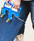 Original EZGrip Mat Movers, two blue plastic dual‑handle tools lifting a stall mat.