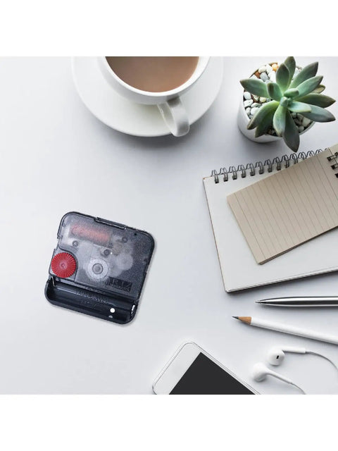 12888 Quartz Clock Movement Replacement Kit with no fuss easy install and swing mute on a desk with coffee and notebook