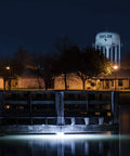 White Underwater Fishing Light 15000 Lumens With Timer And 30ft Cord illuminating water near a dock at night