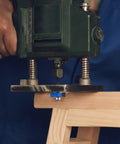 Slick Smooth Heavy Duty Rabbet Router Bit Set 4 Piece Quarter Inch Shank Carbide Tip in use with a handheld router on wood.