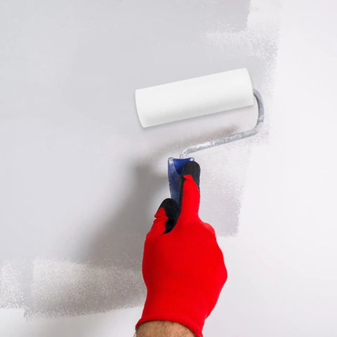 Person using a Pack Of 10 Premium Sponge Paint Roller Covers Featuring Ultra Low Lint Texture Rollers for wall painting.