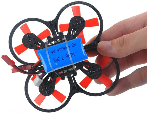 Ultra Compact 400mAh 2S 7.4V 30C LiPo Battery Pack With JST Plug installed in micro FPV racing drone with red propellers