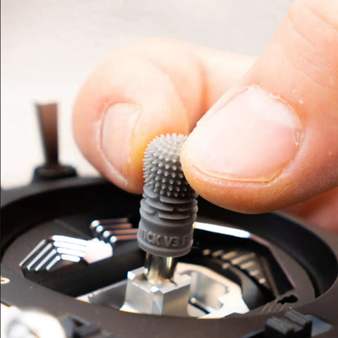 Close-up of adjusting gray FPV Gimbal Joystick Ends Cap For Tango2PRO Flysky EL18 PL18 RC Transmitters Dual Finger Pinch Grip