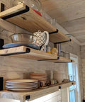 12 Inch Shelf Brackets 4 Pack Heavy Duty Frosted Black With Lip For Floating Shelves in use on wooden kitchen shelves