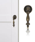 Vintage Zinc Alloy Cabinet Handle Single Hole Round Antique Pull with bronze finish on white cabinet door