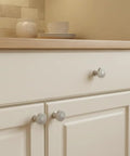 Kick Up Your Cabinet Game With These Premium Brushed Satin Nickel Round Knobs, 10 Pack, Showcasing Delicate Filigree Cutouts For Instant Room Glow And Super Comfortable Daily Handles on kitchen cabinets.